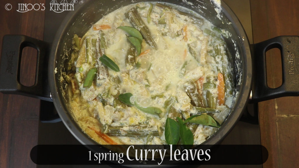 Add fresh curry leaves and drizzle some coconut oil. mix well. 