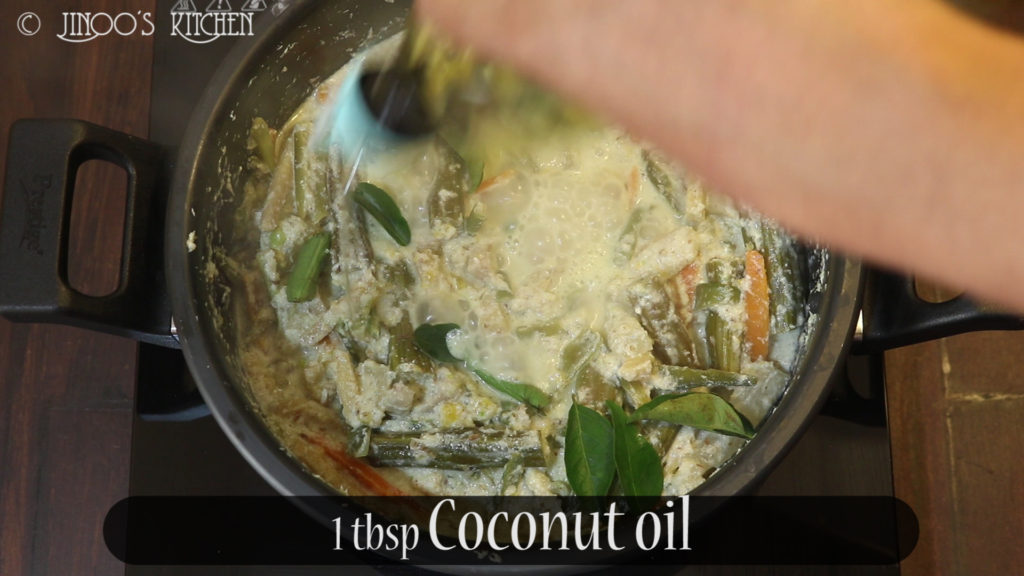 Add fresh curry leaves and drizzle some coconut oil. mix well. 