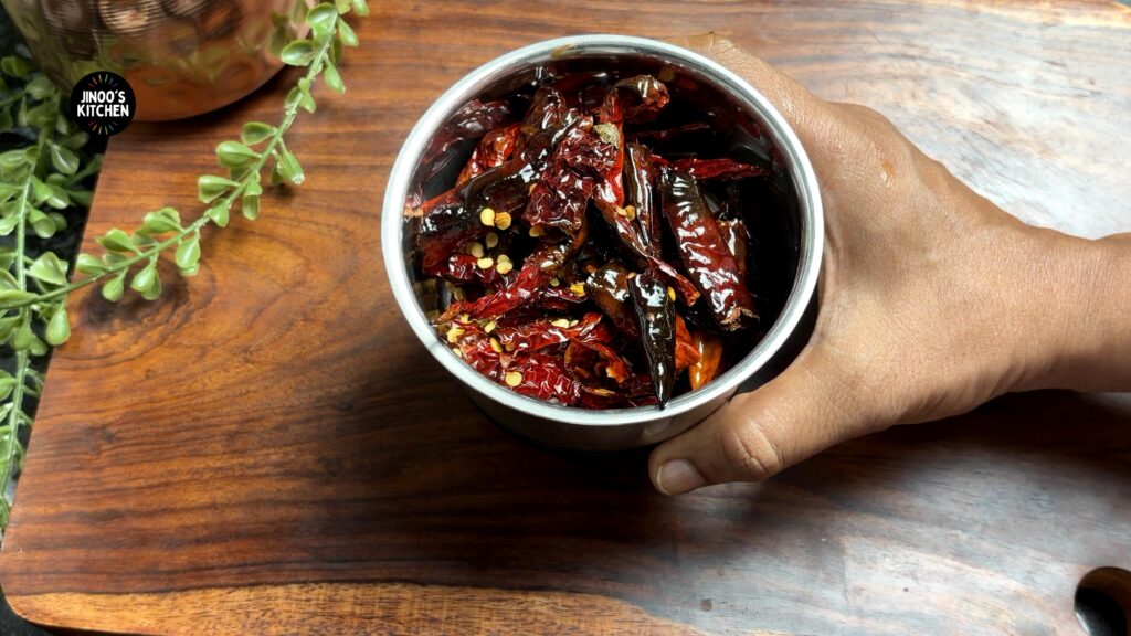 transfer the roasted chillies to the blender jar