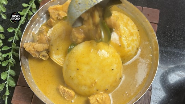 Simple chicken curry served with hot idli and kal dosa