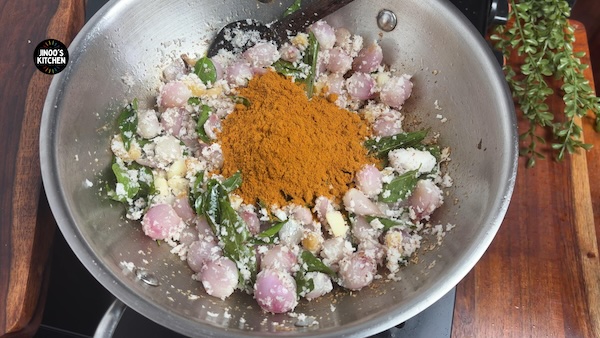 Chicken masala added to roasted coconut and onion mixture