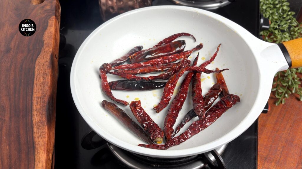 roasting the red chillies until crisp